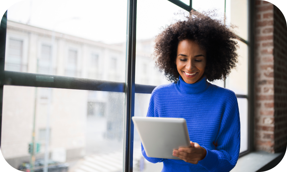 Lady on ipad in blue jumper